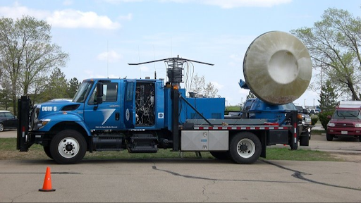 Doppler radar truck in scanning configuration (real-world reference).
